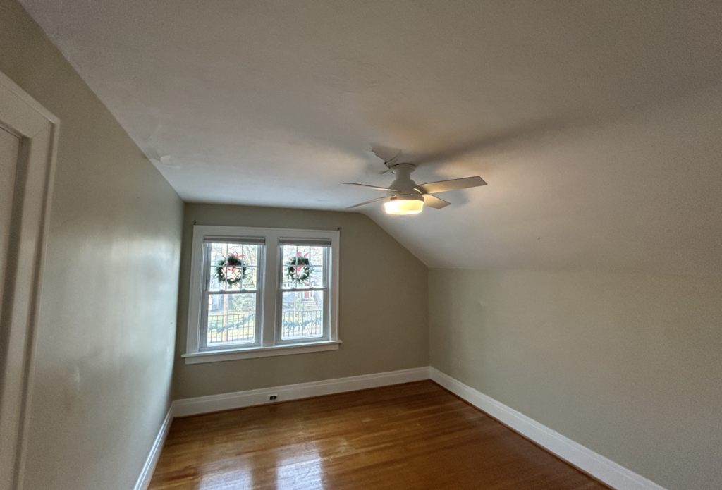 bedroom with numerous plaster bulges