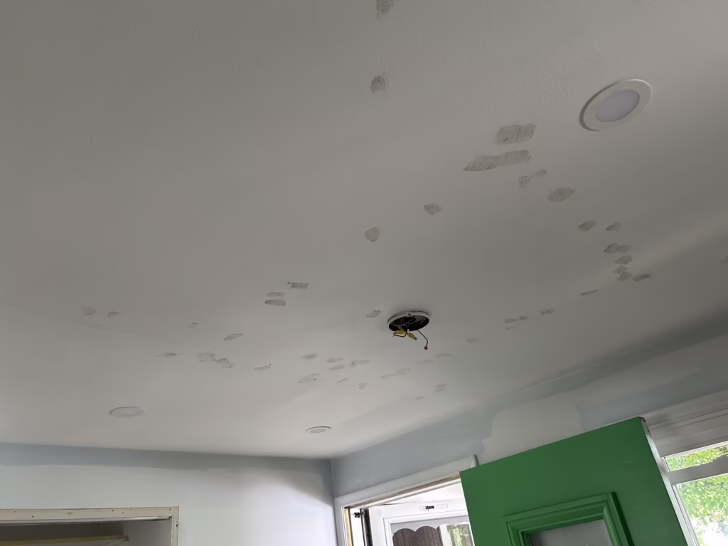 Drywall Restoration and Painting in Green Acres, Tonawanda, NY 26 minor ceiling damage from a hand stapler.