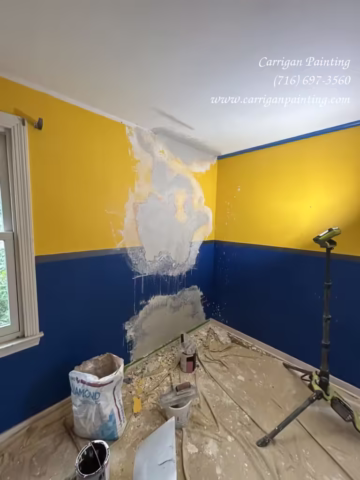 Room with patched wall and paint