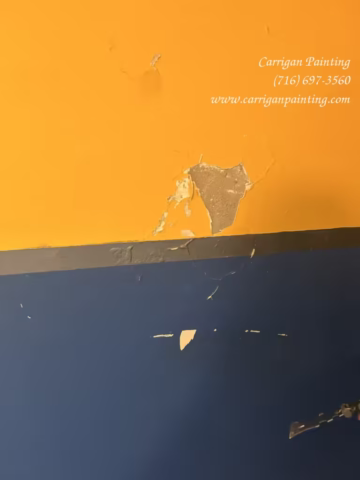 water damage to interior plaster wall in Kenmore NY