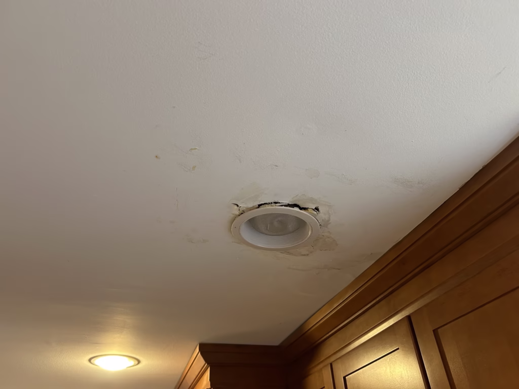 East Amherst Drywall Repair and Painting 2 Water damage around recessed kitchen lighting in Roxbury Park East Amherst 14051