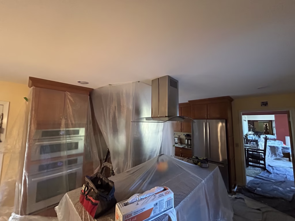 East Amherst Drywall Repair and Painting 7 Dust containment box in kitchen for ceiling repair in Roxbury Park East Amherst 14051