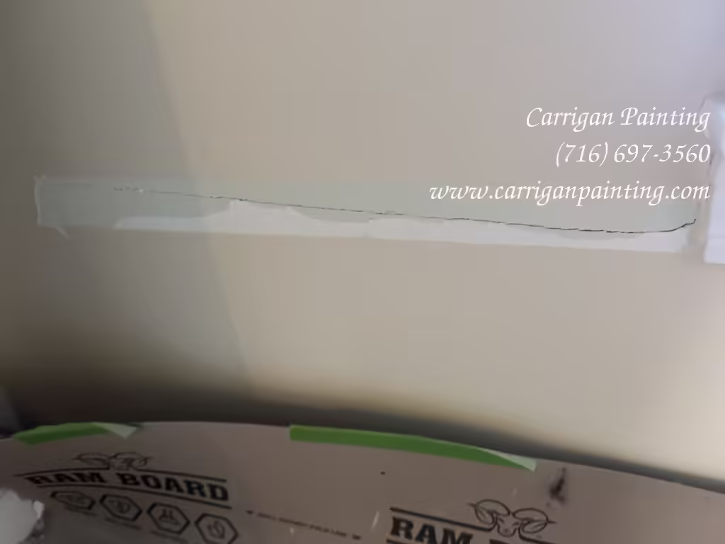 removed impropert patching of plaster crack in Snyder NY 14226