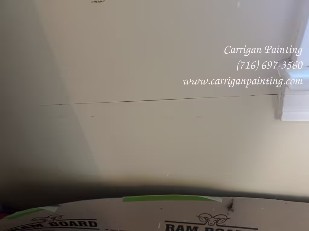 Improperly repaired plaster wall crack in Snyder NY 14226