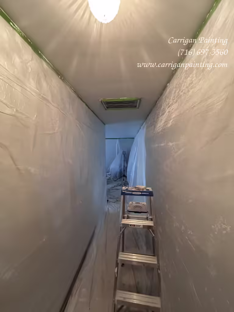 Sanding skim coated plaster ceiling
