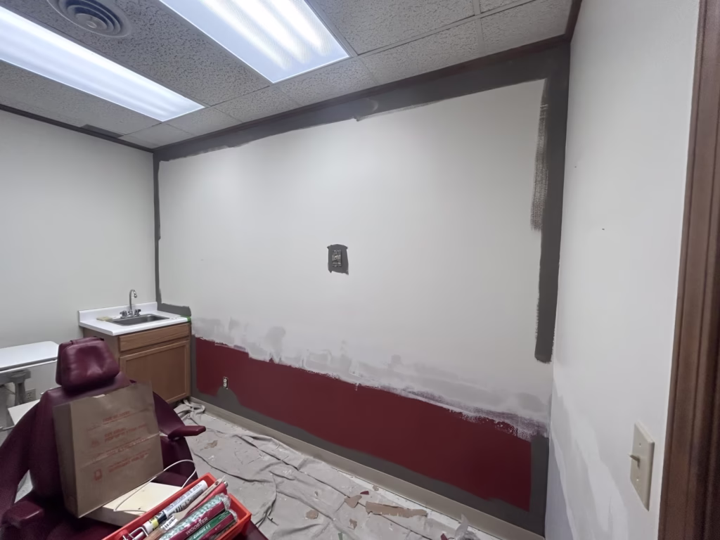 Preparing walls to be painting in Amherst NY 14226