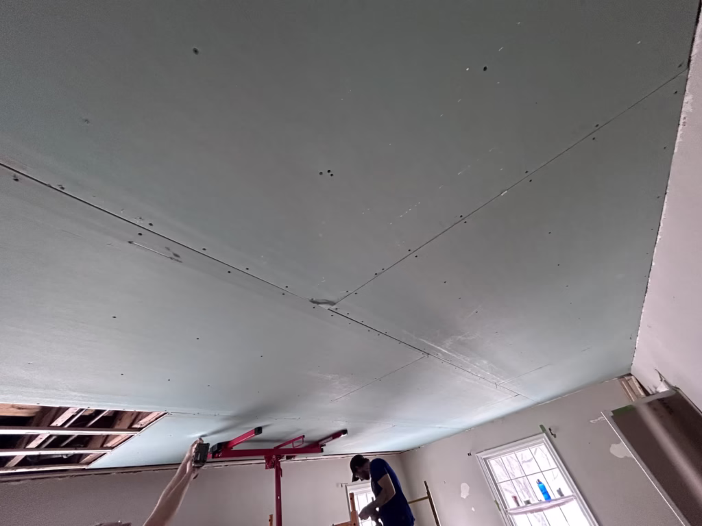 installing a new drywall ceiling in a living room