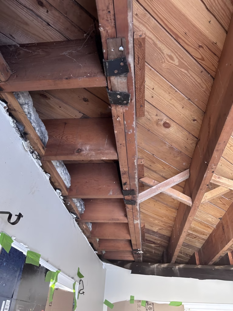 heavy duty joist hangers found above plaster ceiling