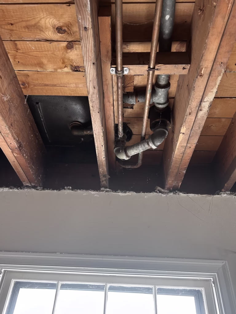 Plumbing detail in exposed ceiling
