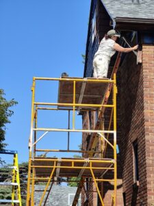 Exterior Tudor House Painting in Kenmore NY. - The Carrigan Archives kenmore ny house painters