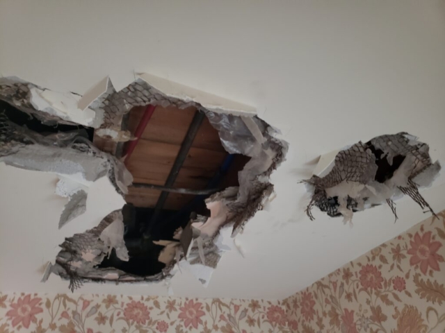 holes in plaster ceiling from plumber