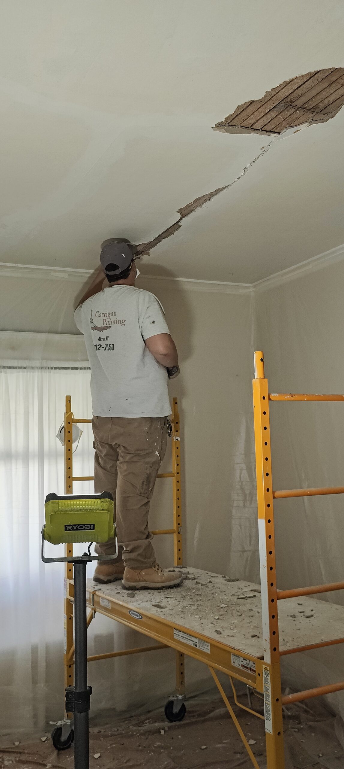 Long-Lasting Exterior House Painting Amherst NY. Quality and Durability. 14 Dave Carrigan Jr repairing damaged plaster ceiling
