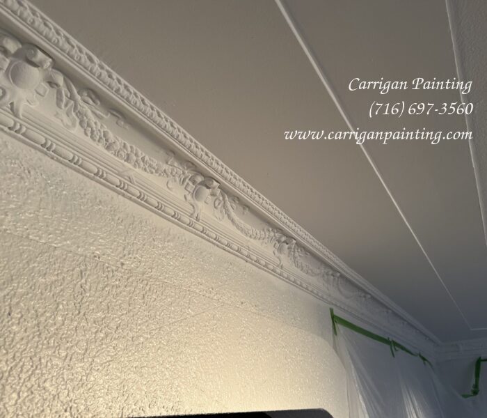 ornamental plaster crown moulding after painting with ceiling paint