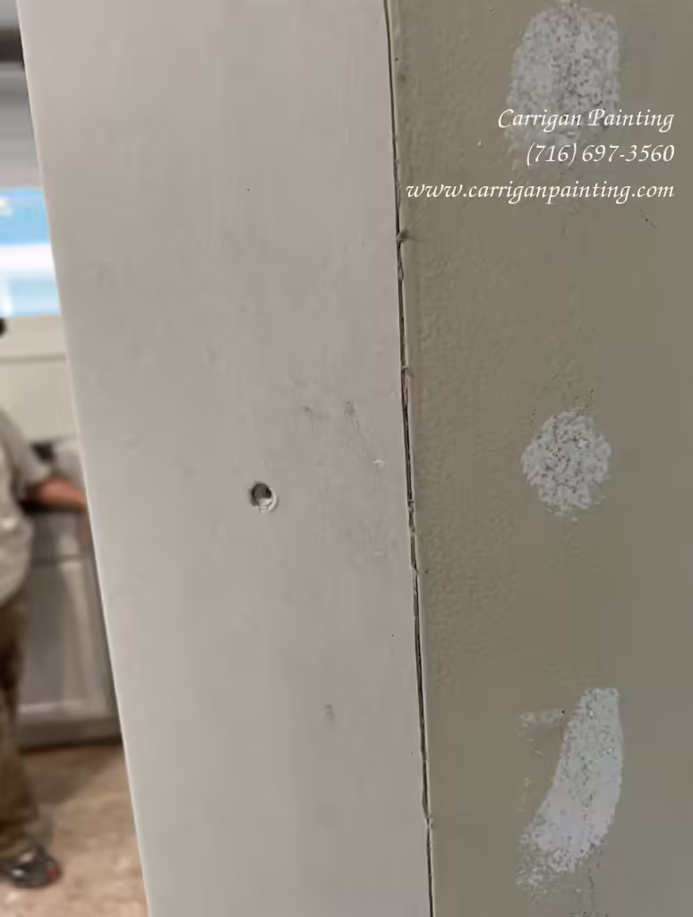 Close up of drywall repair workmanship