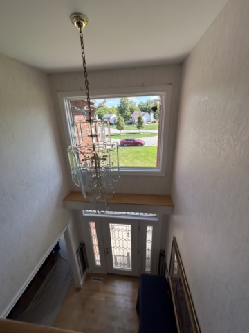 trim painting in foyer in Woodwind Acres, Orchard Park, NY