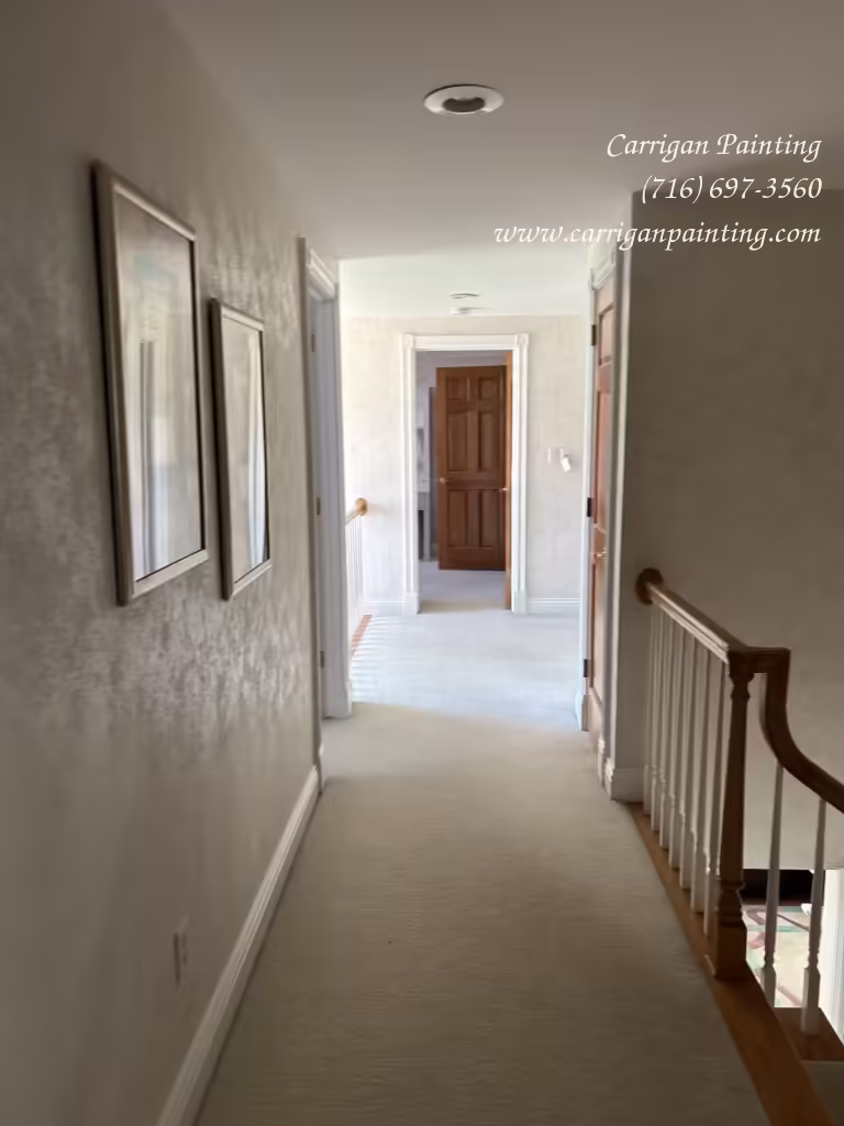 trim painting in hallway  in Woodwind Acres, Orchard Park, NY