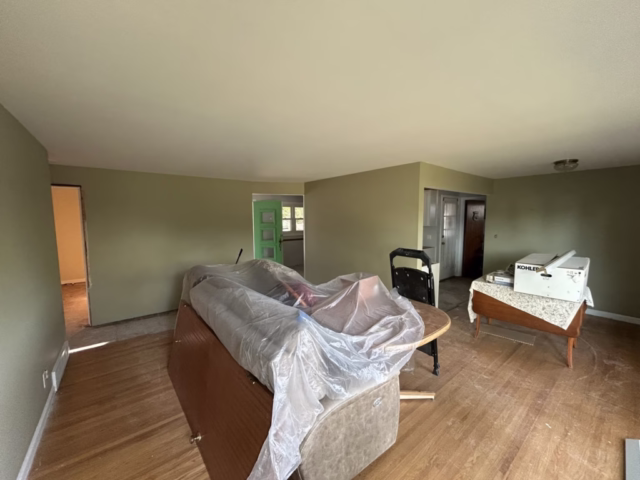 Living room painting after wall repairs in Tonawanda NY