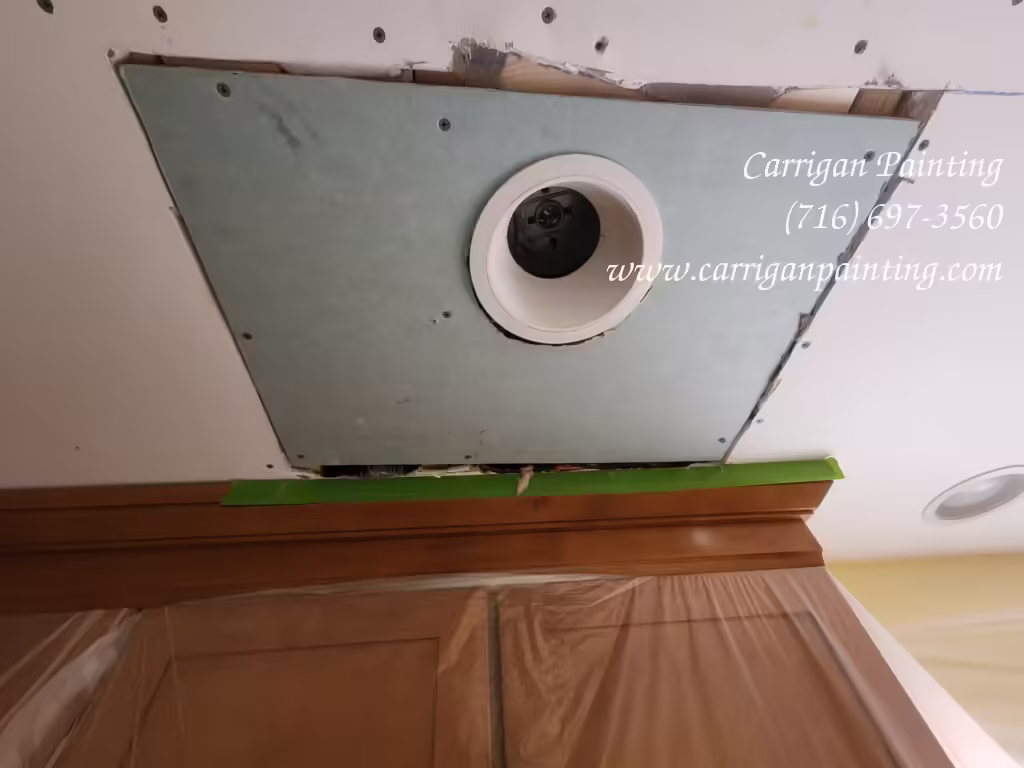 Drywall ceiling repair around recessed lighting in kitchen in Roxbury Park East Amherst 14051