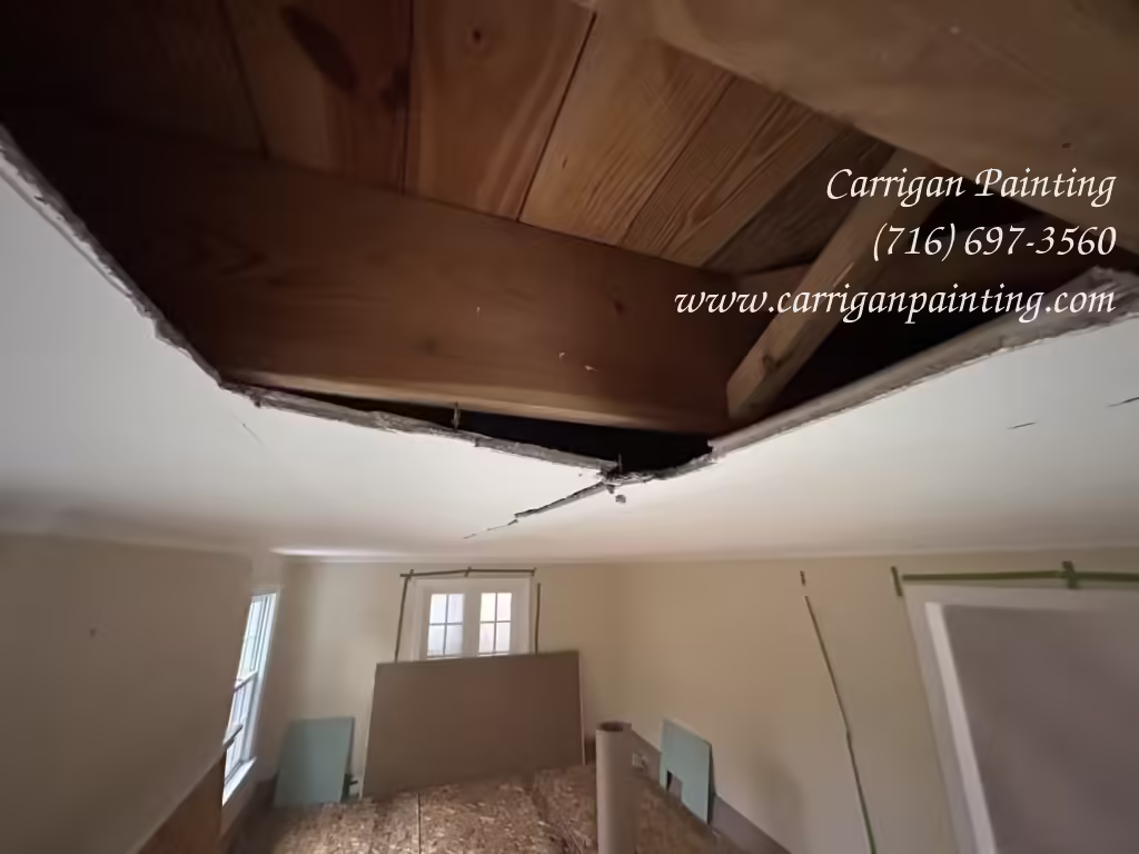 Opened plaster bulge in ceiling in Snyder NY 1446