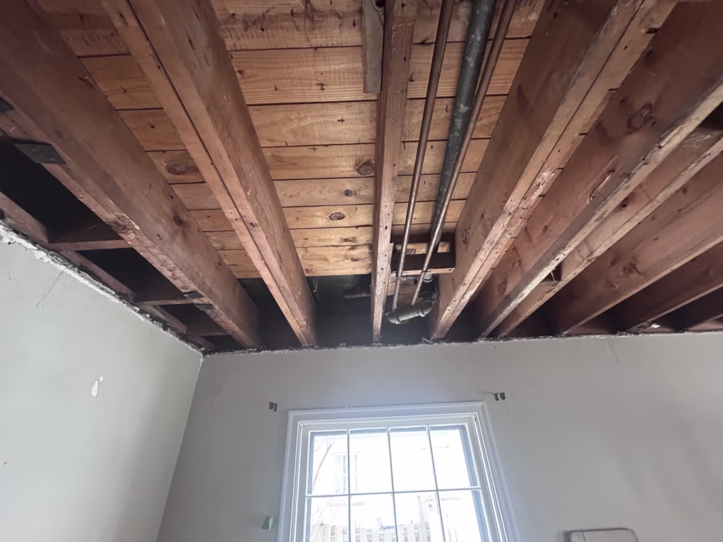 Plumbing detail in exposed ceiling