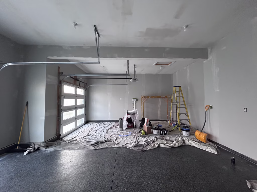 Ceiling and wall patches in new garage