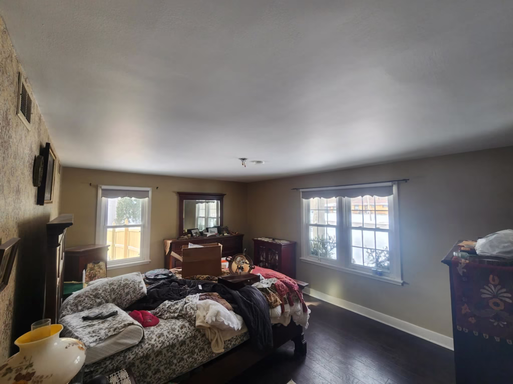 Bedroom freshly painted, damage repaired.