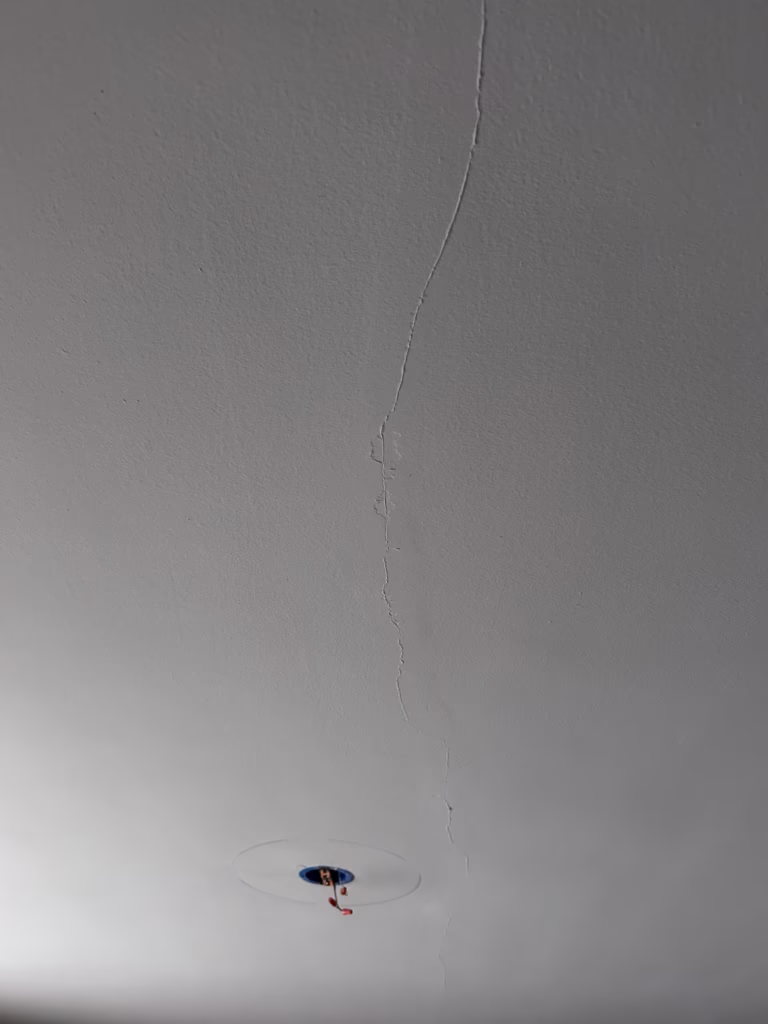 living room plaster ceiling crack